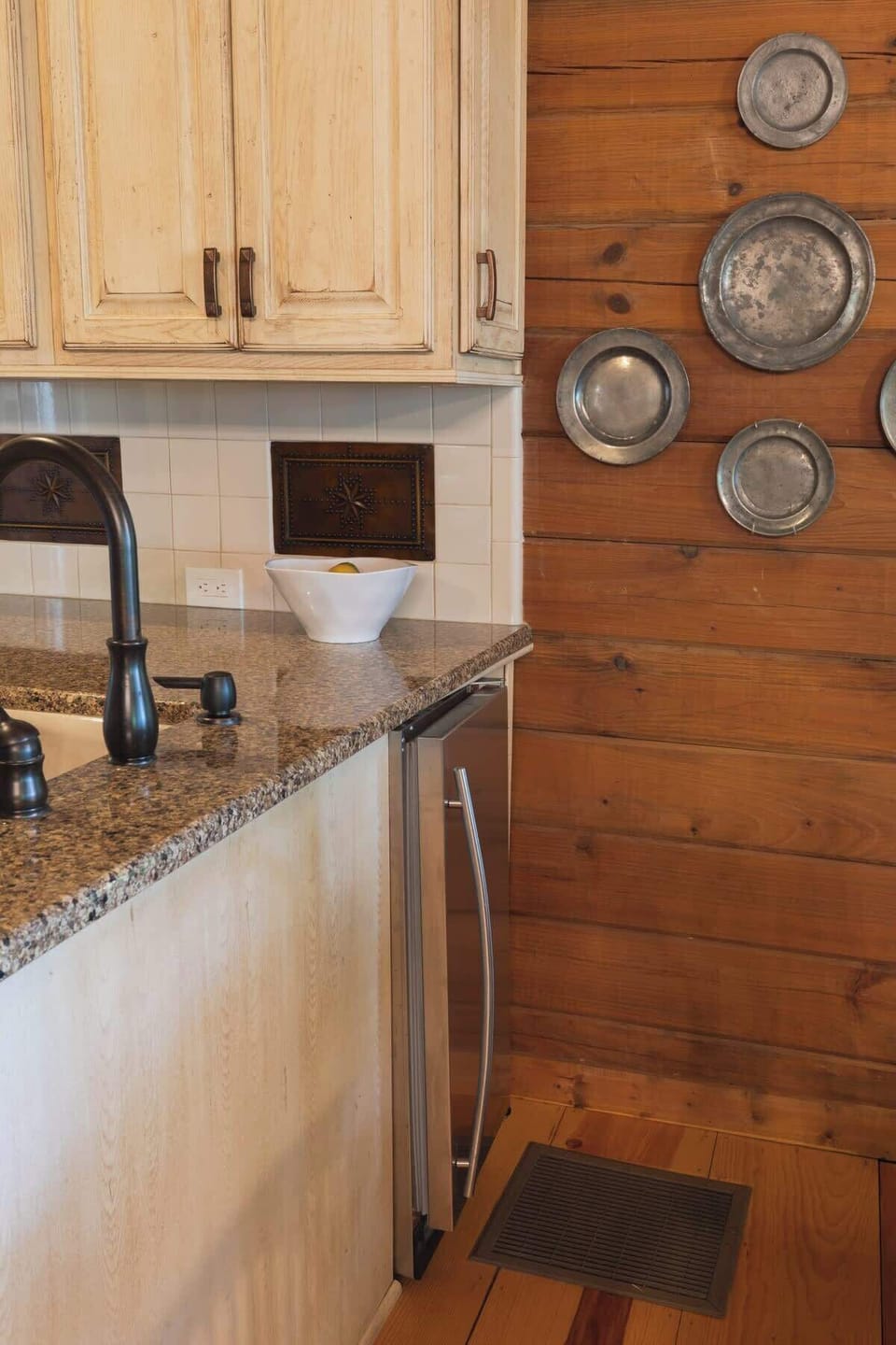 The kitchen is equipped with a convenient stand-alone ice maker, providing a steady supply of ice cubes for your beverages or coolers.