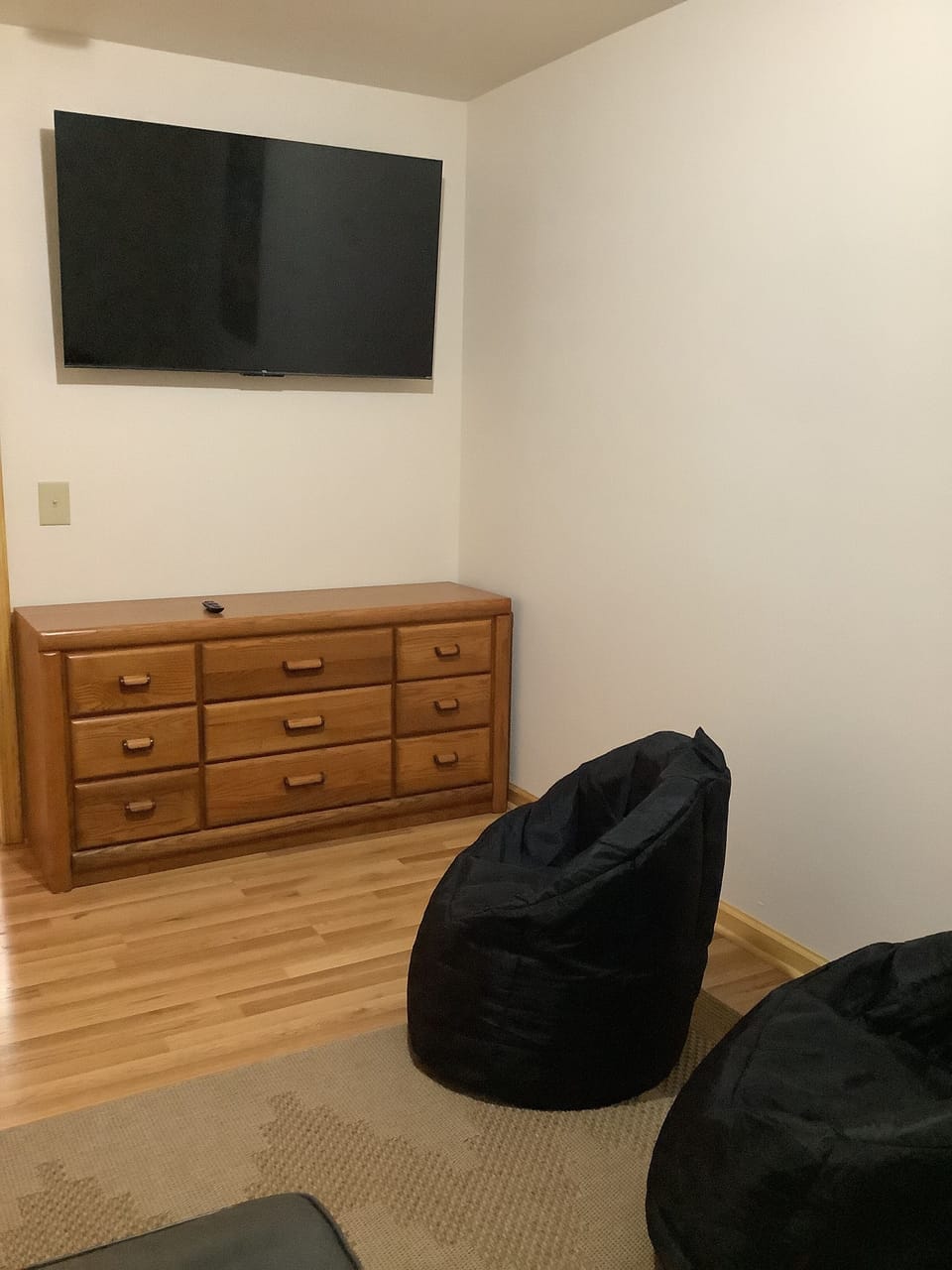 Lower level. 55 inch smart tv , sofa and chairs. Relaxing