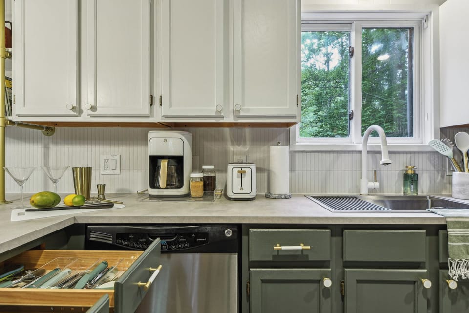 Stocked with cutlery, utensils, drinkware, barware, coffee maker, toaster & more