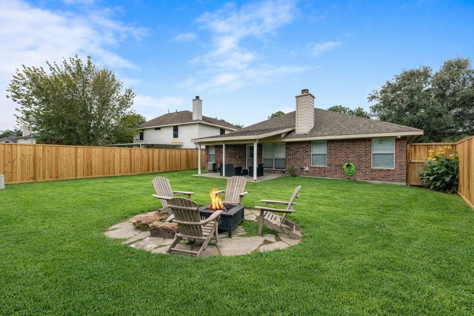 Cozy evenings under the stars around the fire pit with comfortable seating.