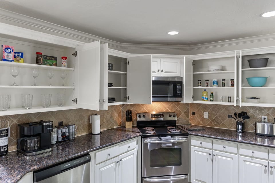 Fully Equipped: Modern appliances and everything you need to cook at home.