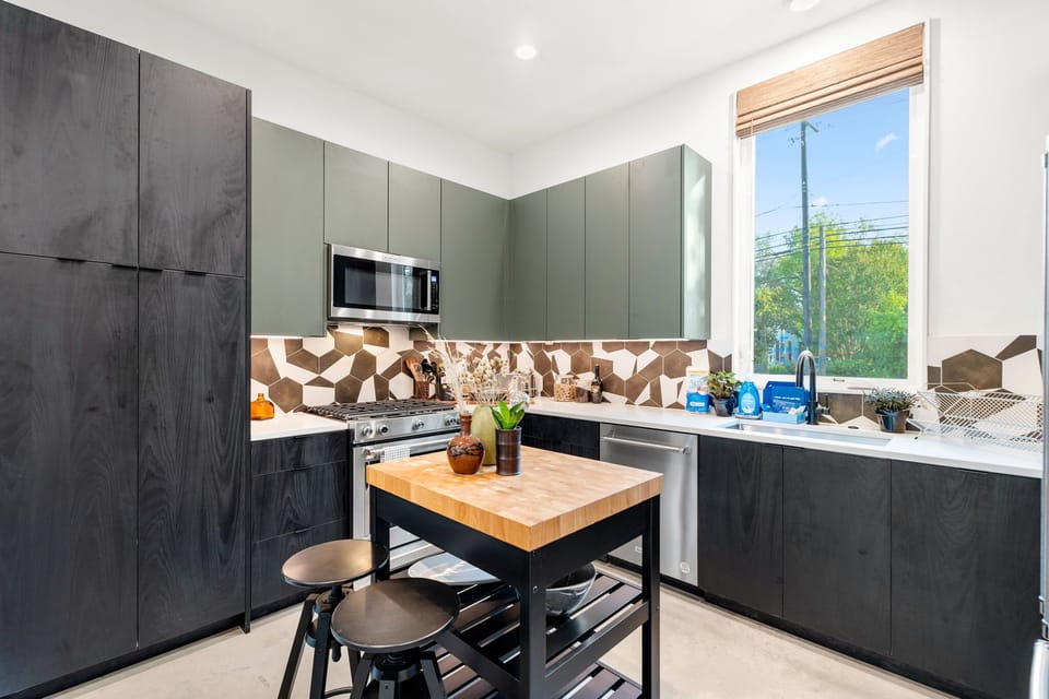 The updated kitchen offers ample space & all the comforts of home