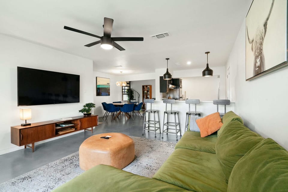 Curl up in the stylish living room & stream all your favorite entertainment