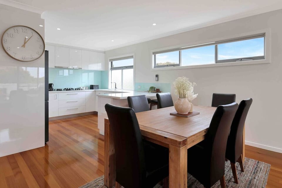 Dining space with seamless access to fully equipped kitchen