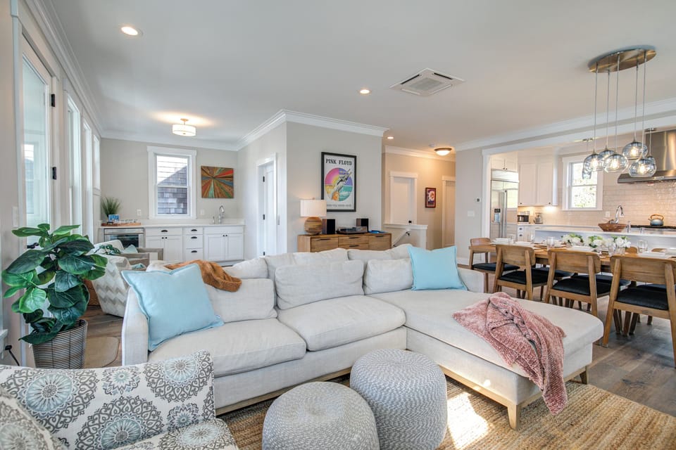 The living room shares the open floor plan with the dining room and kitchen.