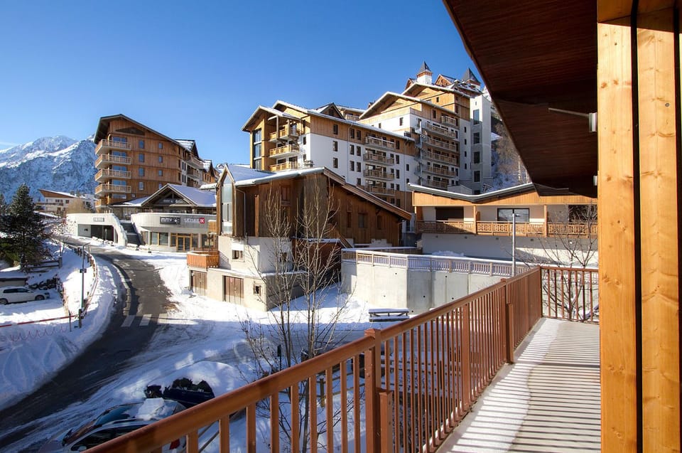 tep out onto your private balcony to take in panoramic views of the surrounding mountains and charming village. The perfect spot to enjoy your morning coffee or an evening glass of wine.