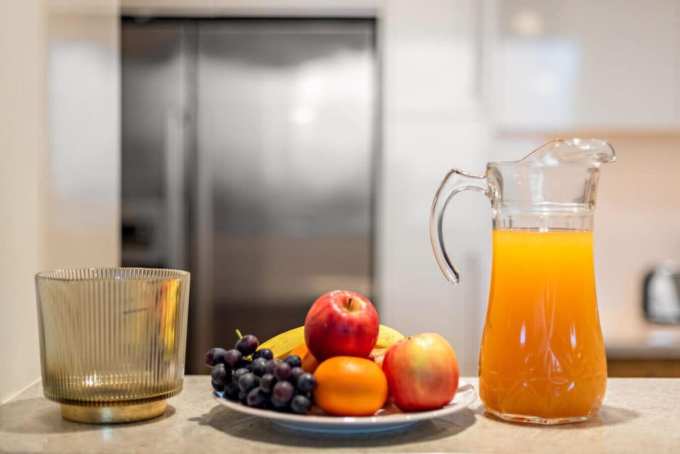Kitchen Delight: Refresh your mornings with fresh fruits and vibrant juices at your fingertips!