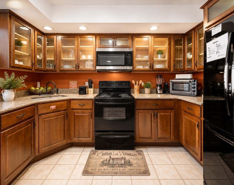 The warm, inviting kitchen offers ample space & every home comfort