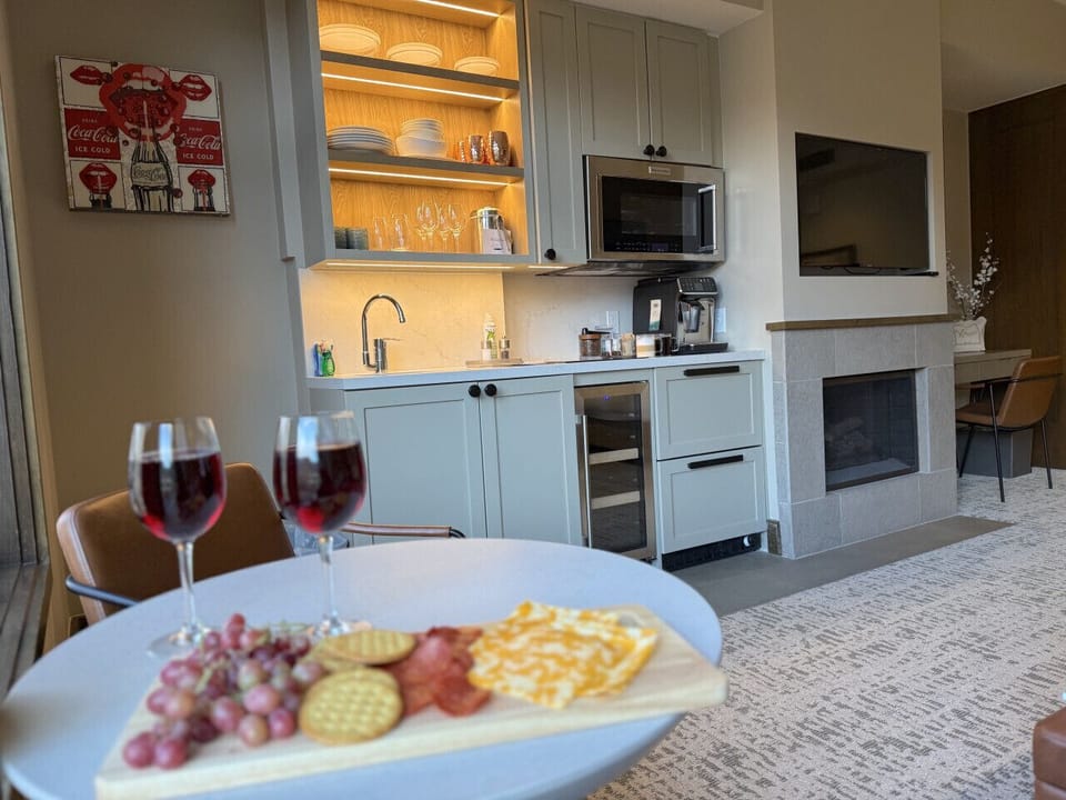 Fully stocked kitchenette: cooktop, micrwave, refrigerator, freezer, wine chiller