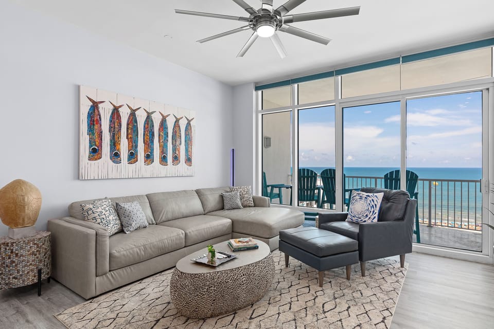 Relax in a bright, open living space with stunning ocean views