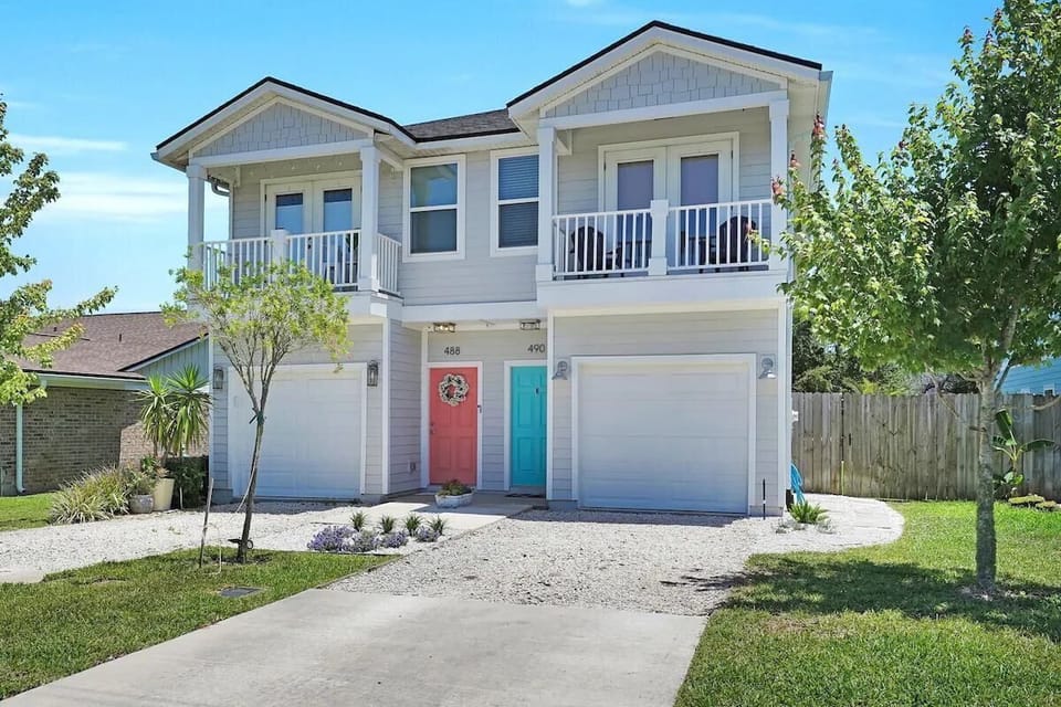 1 Car Attached Garage, and room for 2 more on the driveway.
