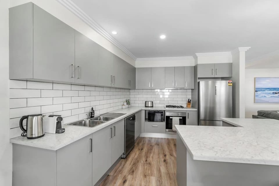 The gourmet stone kitchen comes fully equipped with high-quality appliances and cooking utensils.
