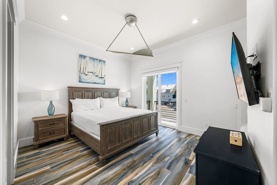 Bedroom 3 (Second Floor) has king-size bed, beautiful decor, and plenty of natural light. Step out onto the balcony to enjoy the fresh air and relax in this peaceful retreat.