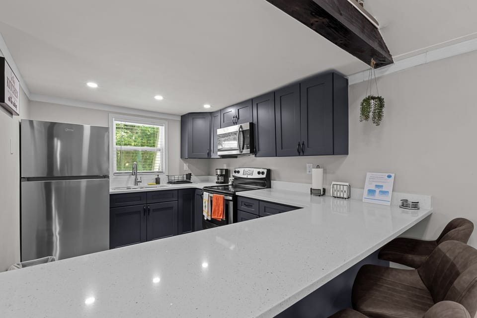 New, fully stocked kitchen with all cooking essentials. Blender, Coffee Machine, Toaster, Pots, Pans