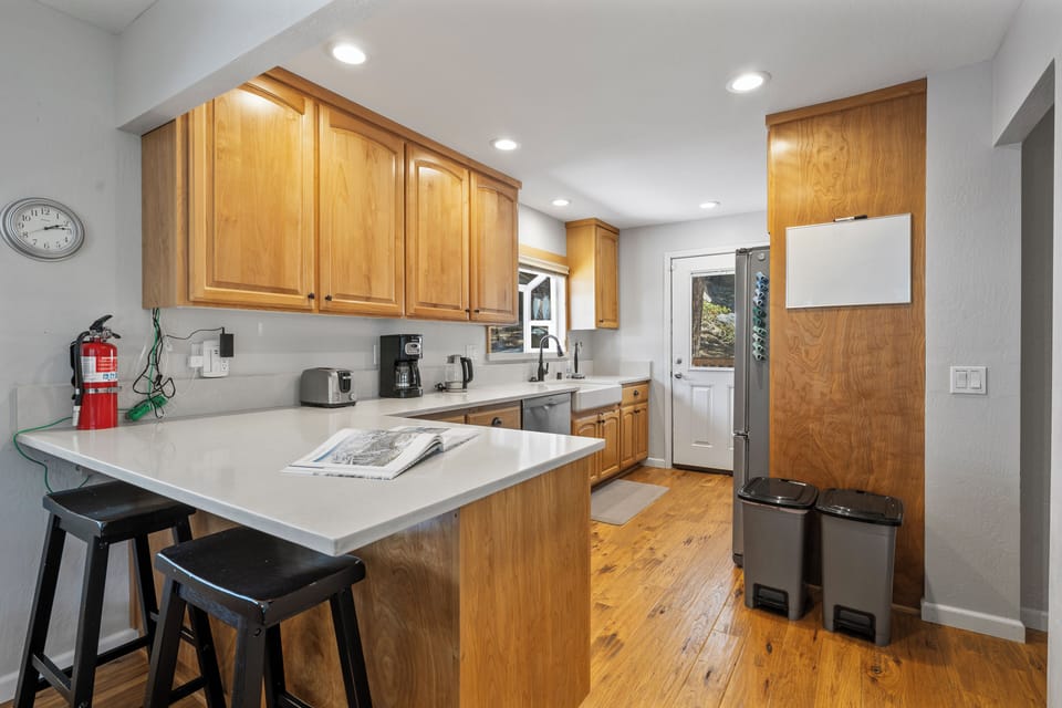 A fully equipped kitchen and dining area are ready for your culinary creations.