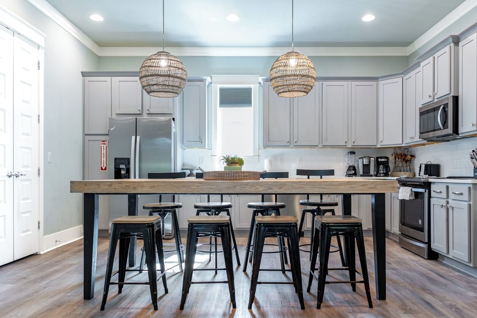 Counter island with 8 barstool seats.