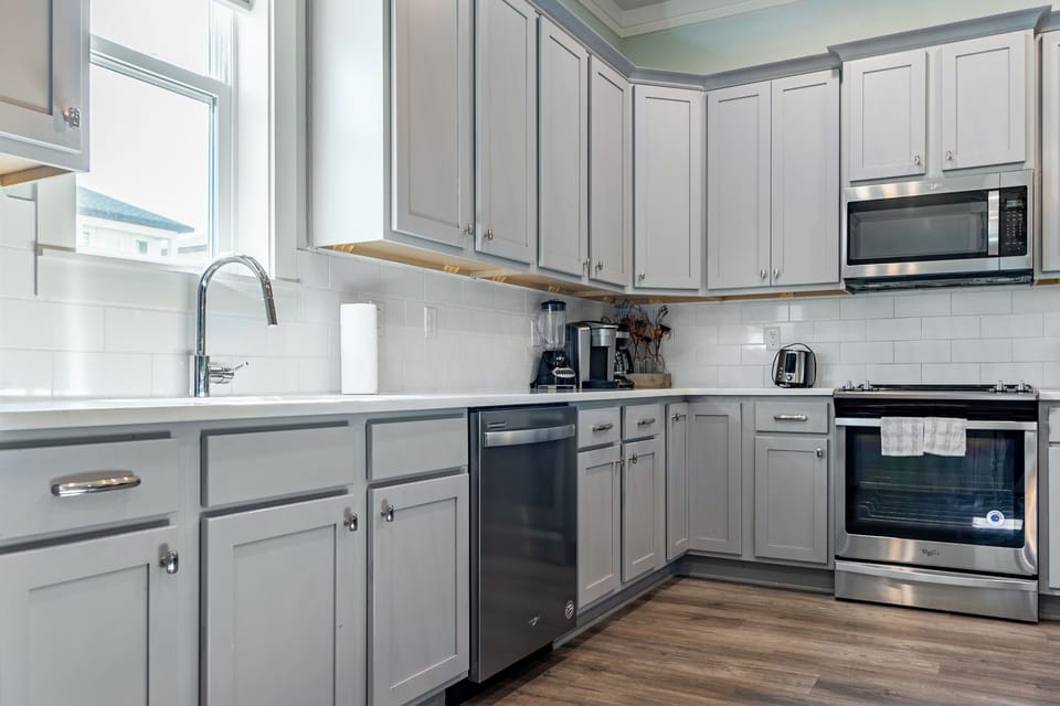 Sleek, fully equipped kitchen.