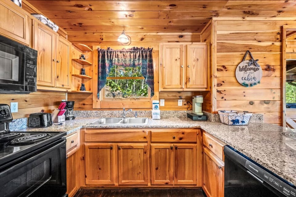 Pots/Pans, Dishes, Plates/Bowls and silverware are provided. The cabin also includes a knife set, toaster, and multiple coffee makers.