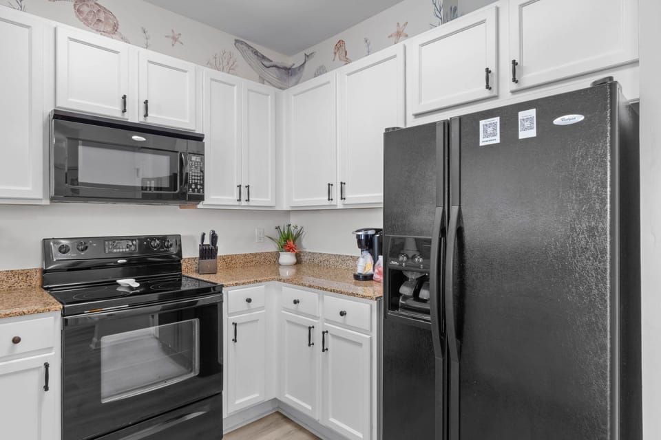 Spacious kitchen with all of the comforts of home, Refrigerator w/ Ice and water