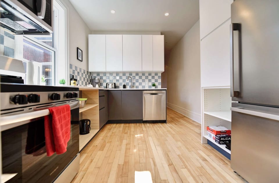 Large kitchen, washer and dryer in the room right beside