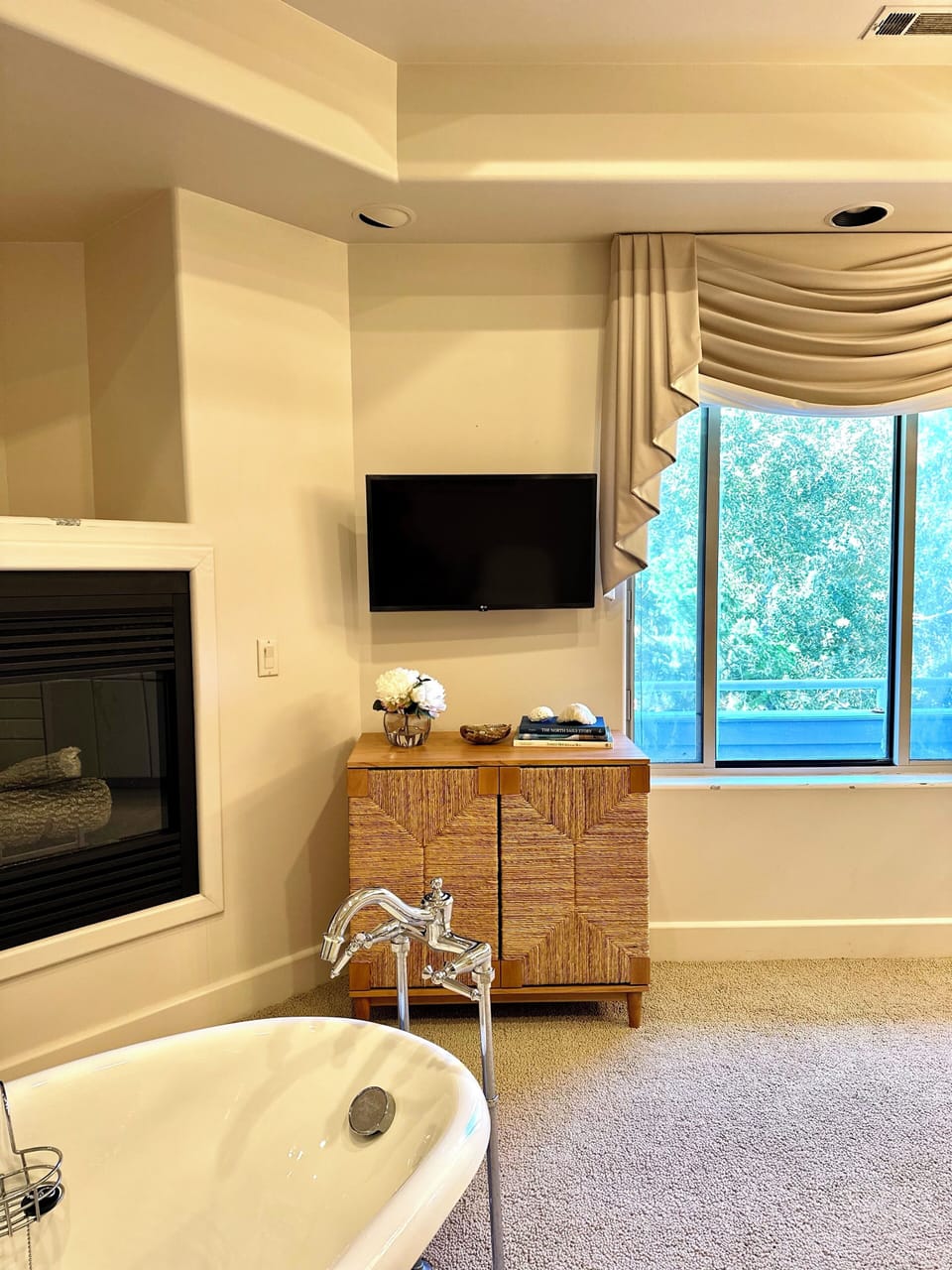 Watch TV while relaxing in the tub