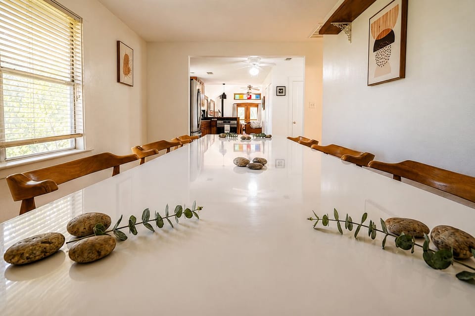 Bright open dining space with long table seating for memorable group meals