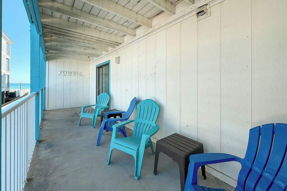 The furniture on this private balcony has been updated to two sets of captain chairs (a total of 4 chairs) with connecting side table to enjoy your favorite beverages while enjoying the breathtaking Gulf view.
