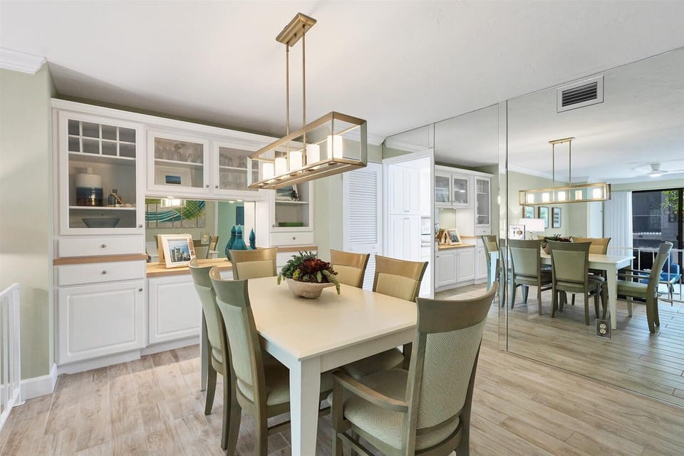 Dining area overlooking living room. Dining table seats 6