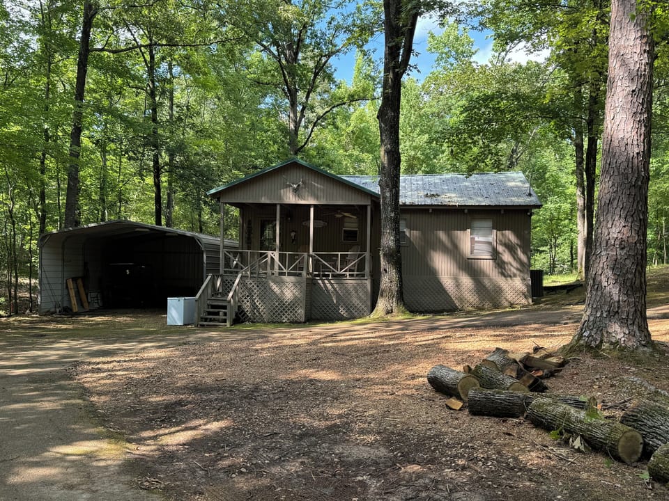 Front of property displaying parking area
