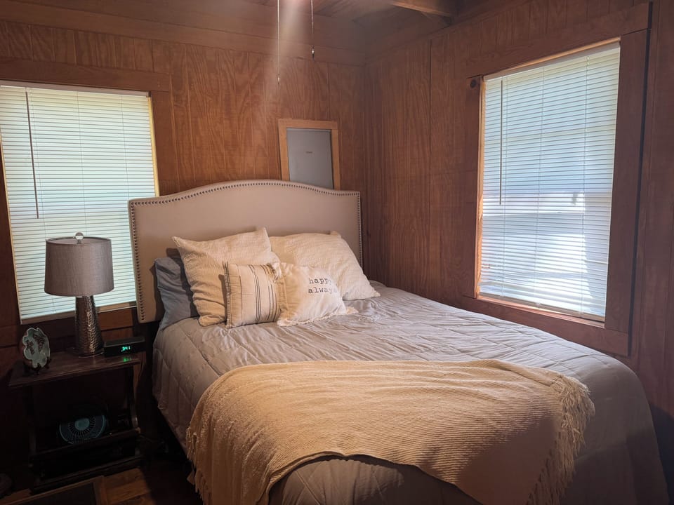 Bedroom features one queen bed