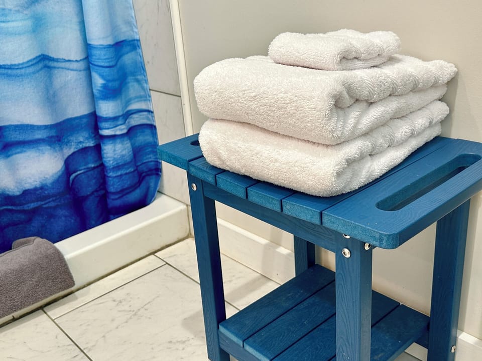 Plush bath and beach towels are provided for every guest.
