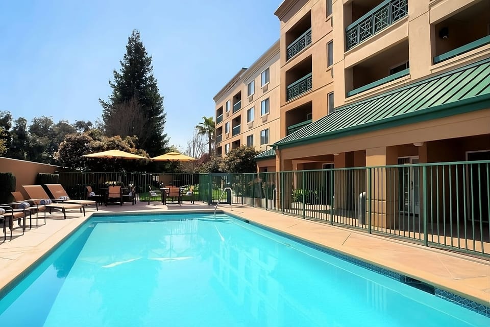 Soak up the sun beside the refreshing outdoor pool.