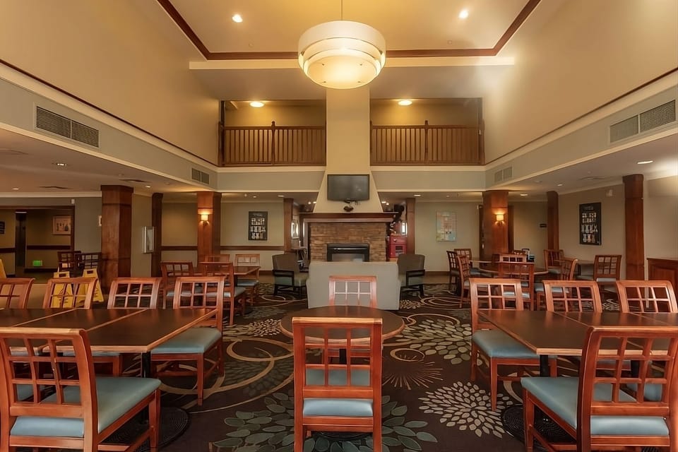 Settle in by the fireplace for cozy evening conversation.