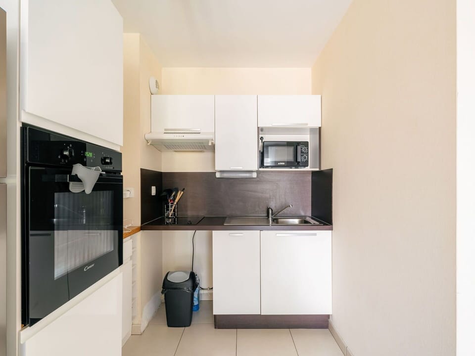 Cabinetry, Countertop, Kitchen Stove, Kitchen Appliance, Building, Home Appliance, Kitchen, Sink, Floor, Flooring