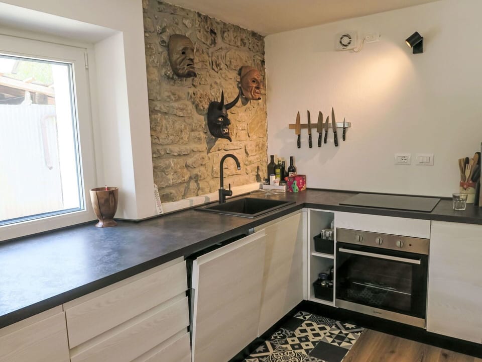 Cabinetry, Property, Countertop, Tap, Sink, Window, Wood, Kitchen Sink, Interior Design, Lighting