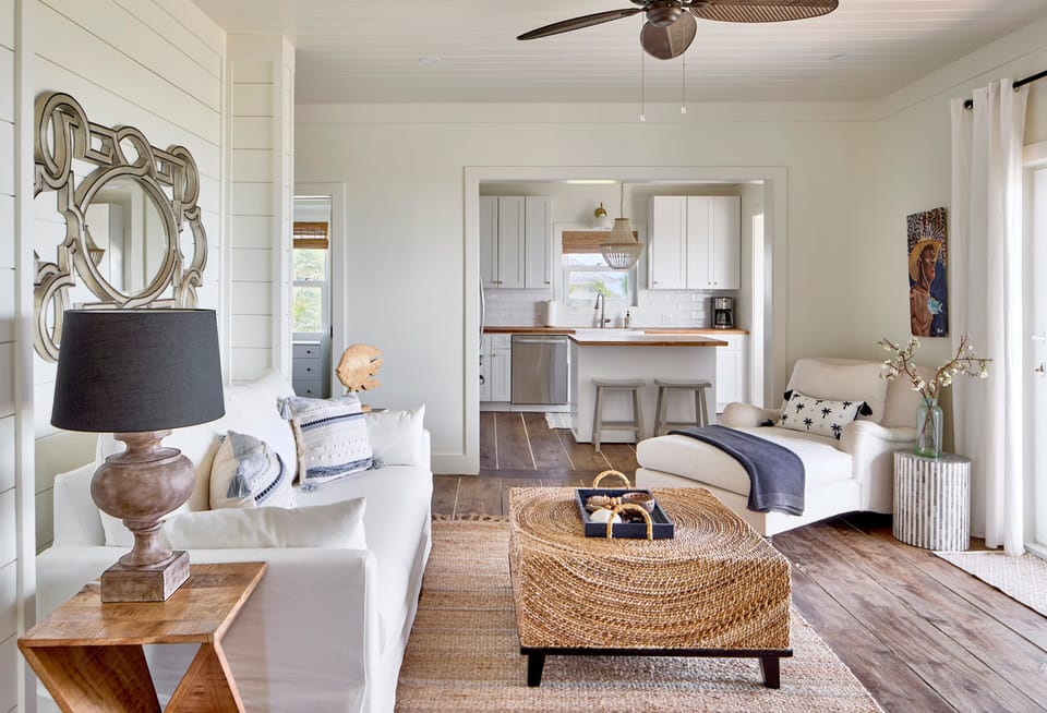 Living area with comfy sofas and oversized chair.