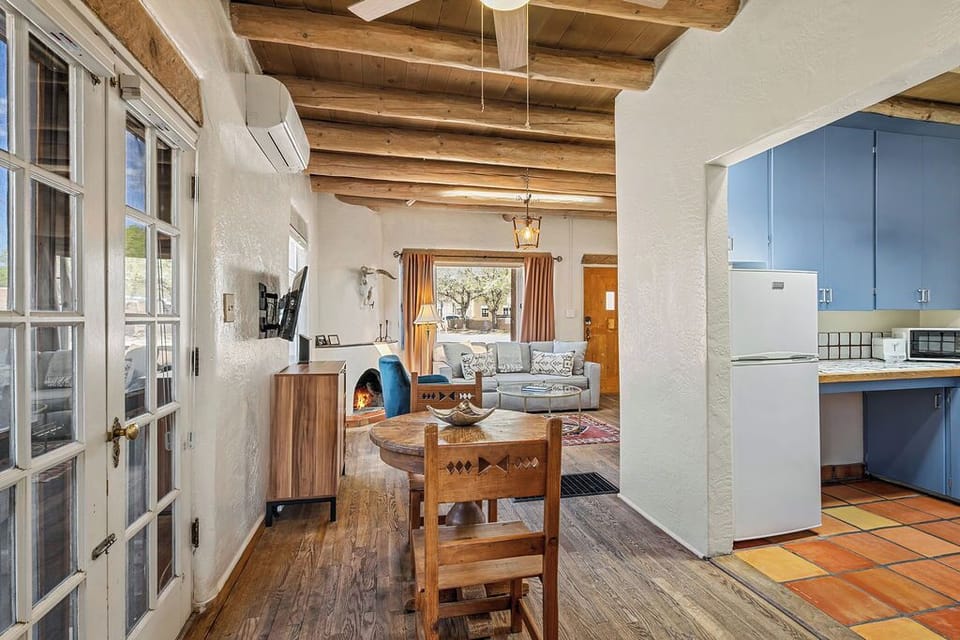 Your charming adobe retreat features exposed vigas, a cozy kiva, and an open layout perfect for unwinding after exploring.