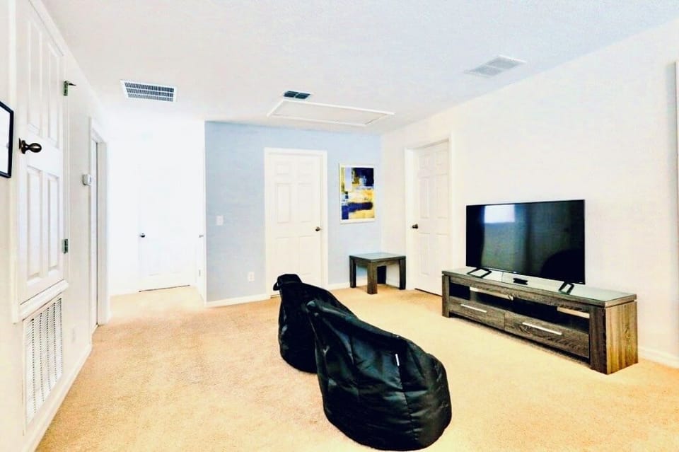 Additional view of the upper floor TV area