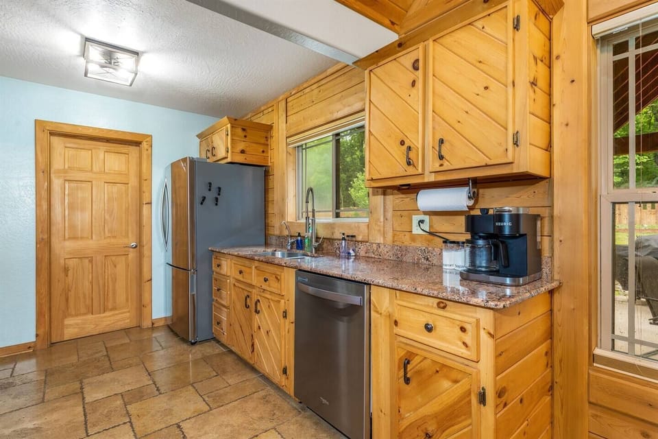 fully stocked kitchen, crock pot, blender, toaster, waffle iron, coffee, bakeware