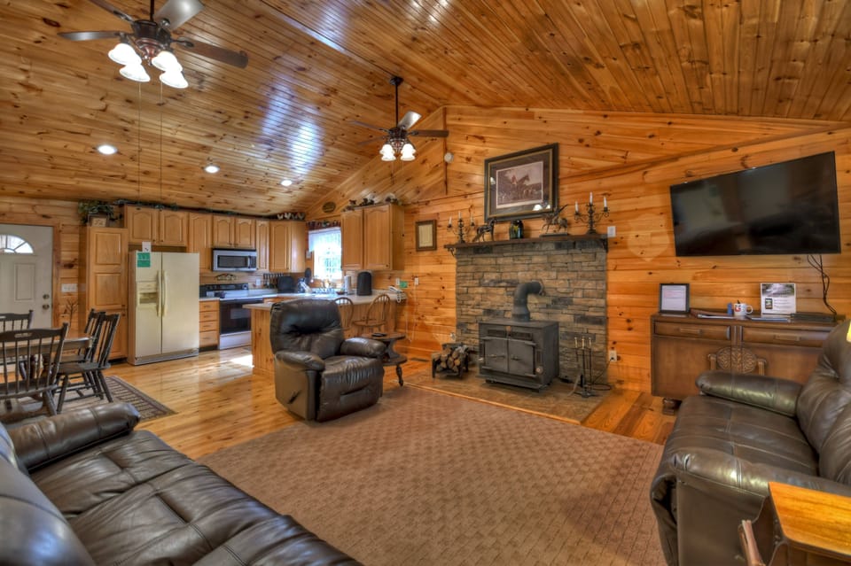Main Level Living Area *Cabin does not offer the wood burning stove in the living room. Cabin has central heating & air*