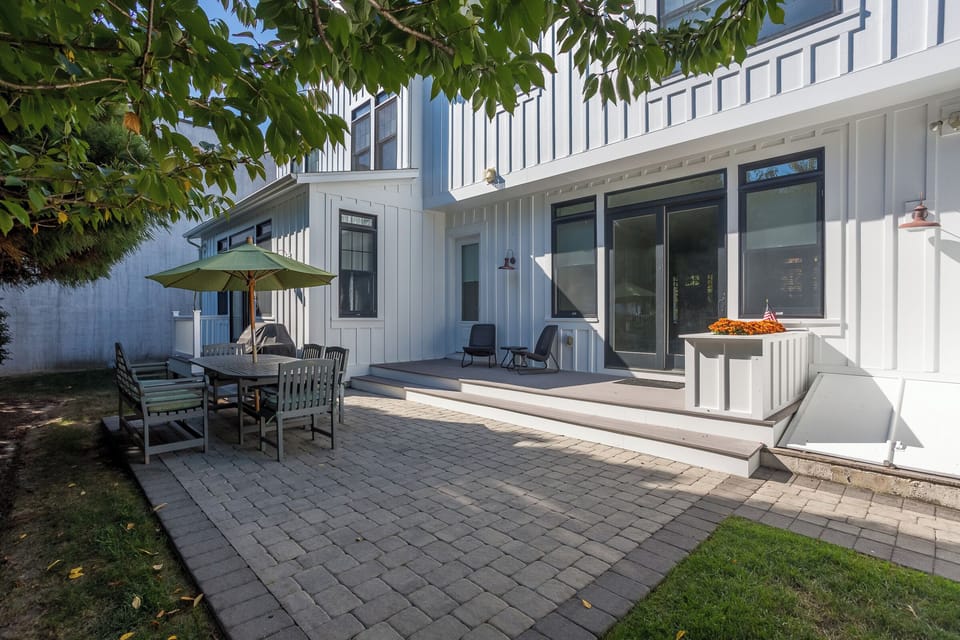 Rear Patio with Seating and Grill