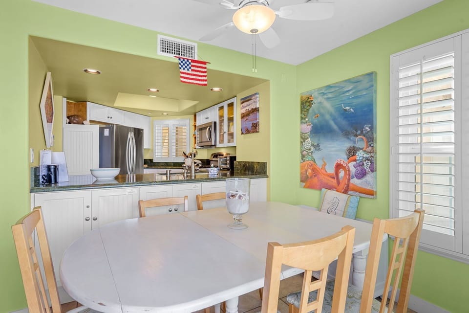 A spacious dining table ideal for all guests to enjoy meals together.