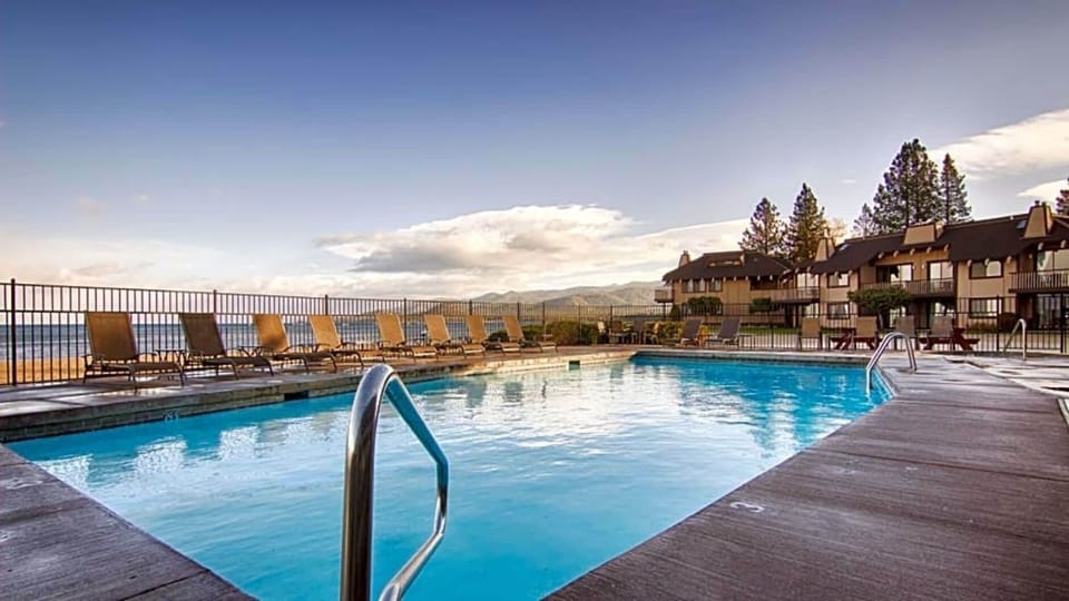 Dive into the sparkling pool and lounge by the lake.