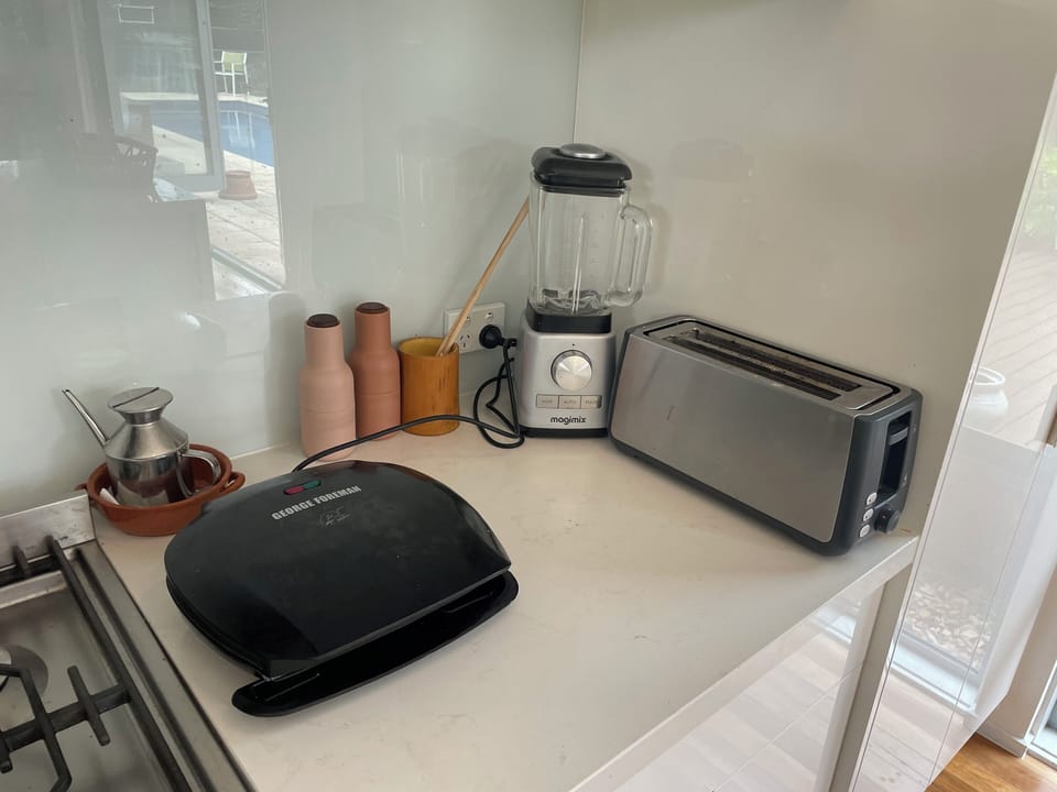 Sandwich maker, high speed Magimix blender, and six bread toaster.