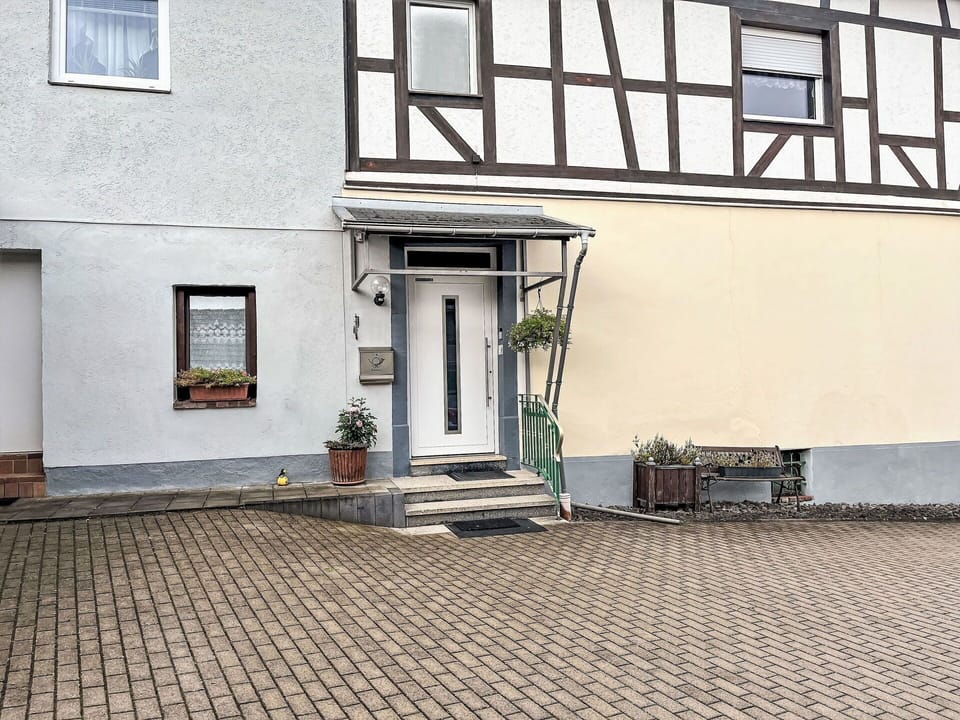 Building, Window, Plant, Road Surface, Lighting, Wood, Flowerpot, Urban Design, Door, Flooring