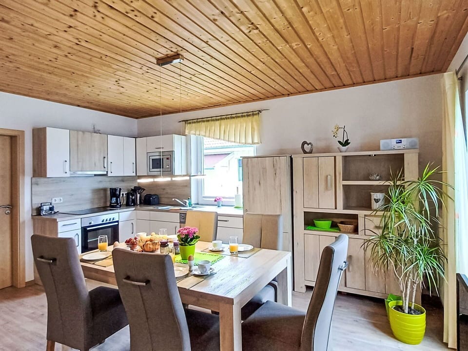 Property, Table, Furniture, Plant, Cabinetry, Countertop, Wood, Houseplant, Interior Design, Flowerpot