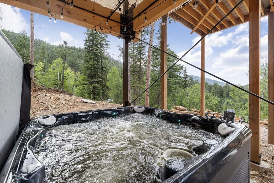 Relax in the private hot tub while soaking in breathtaking views at this cozy A-frame cabin in the heart of the Black Hills.