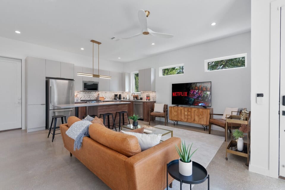 Comfortable living room featuring soft seating and modern decor.