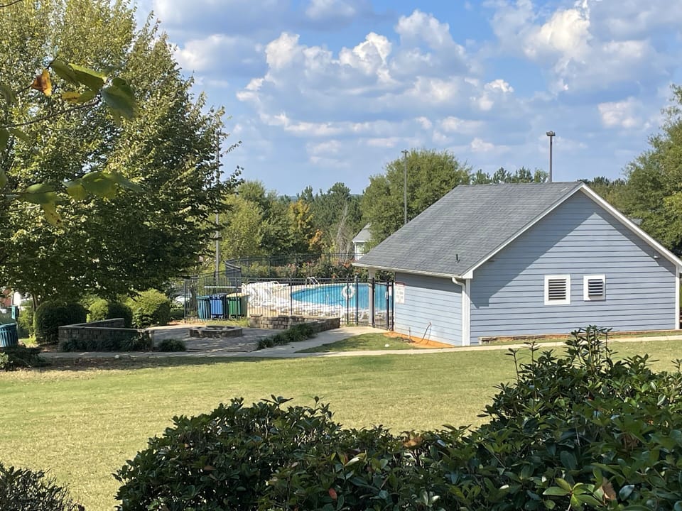 View of the pool area from the back of the house