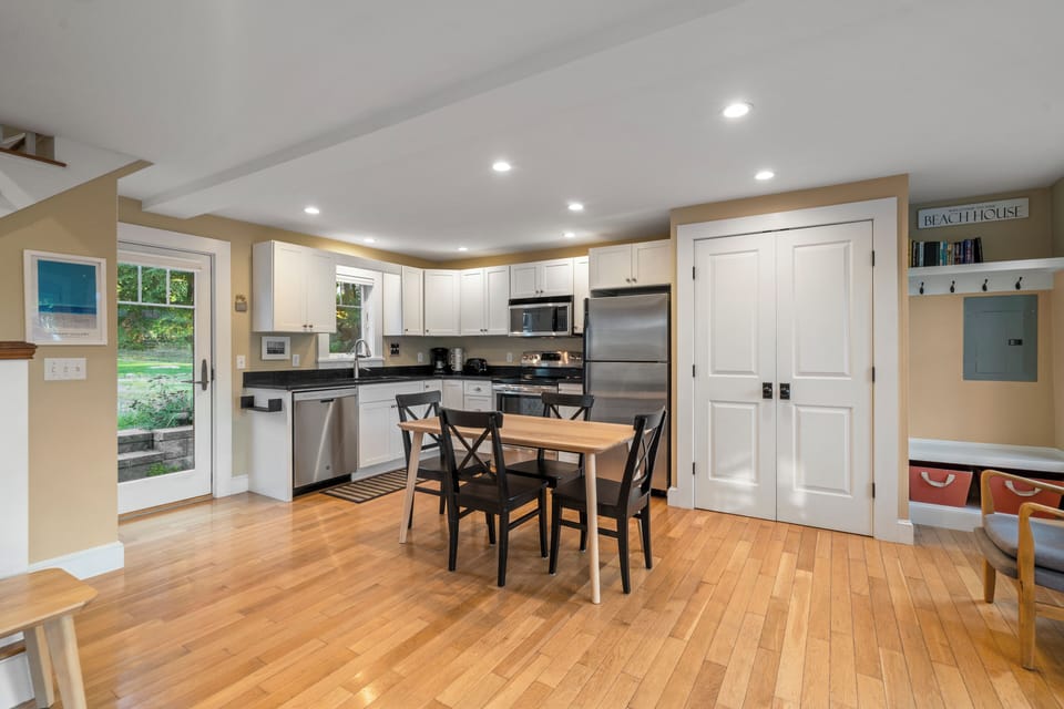 This kitchen includes all the appliances needed for cooking.